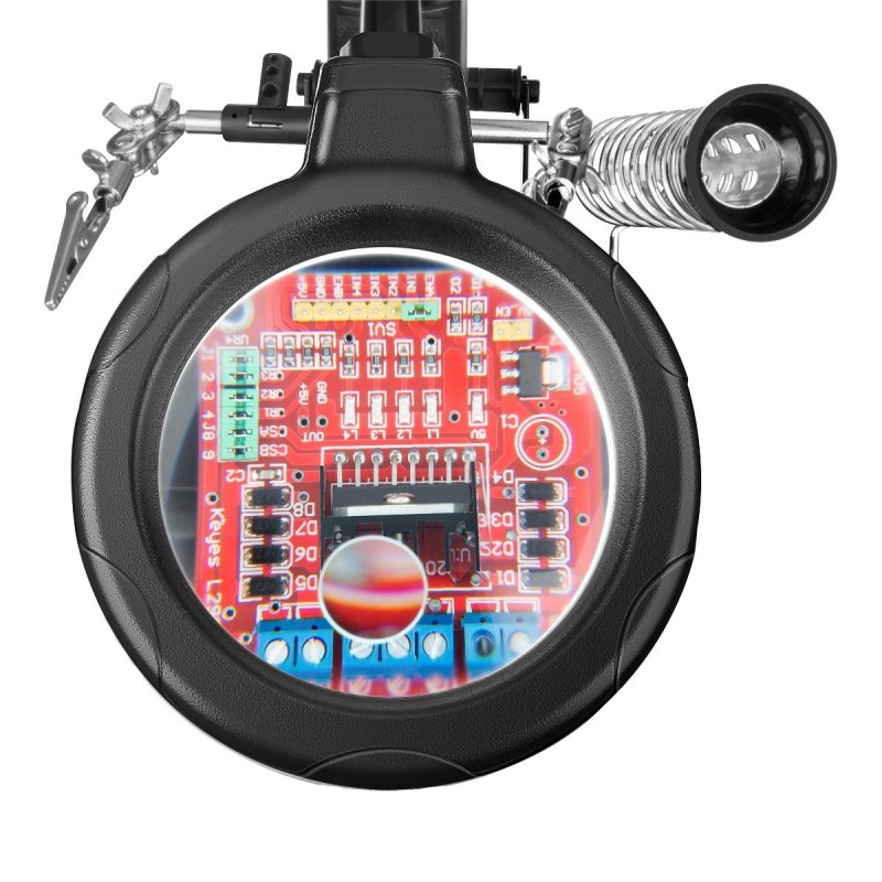 Auxiliar para soldar con lupa y lámpara