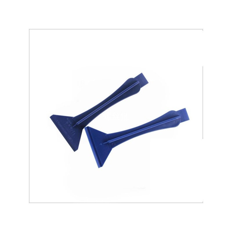 Espátula de plástico.